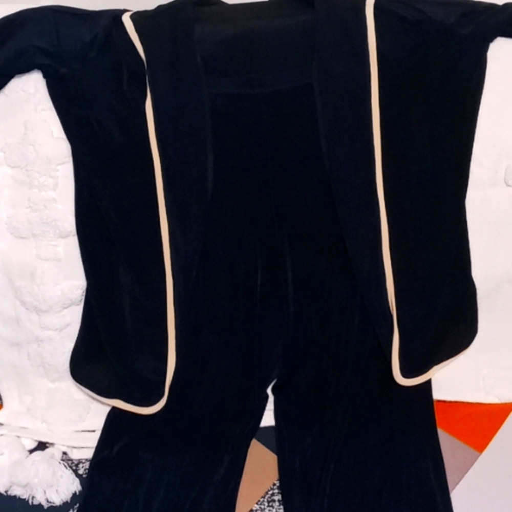 Two piece dark blue jacket and pant set. Size medium brand citiknits